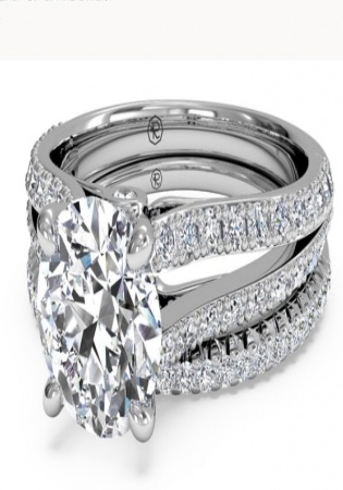 Double french-set diamond 'v' engagement ring with surprise diamonds with matching band