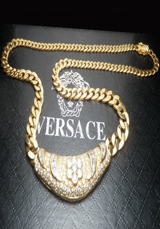 Versace 2.61 carat round and baguette diamond cluster necklace set in 18k gold