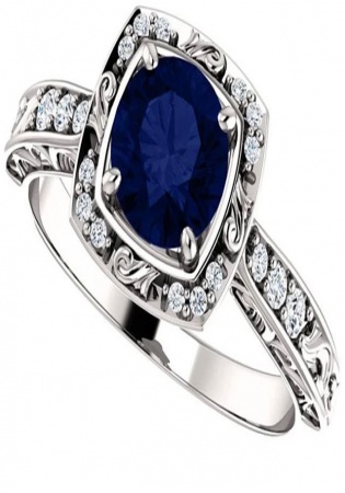 14k white gold vintage diamond halo and blue sapphire engagement ring